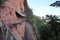 Landscape, pathway, high and steep wooden floor, beautiful sky background on the rocky mountain, Phu Thok Temple, Bueng Kan