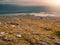 Landscape on a peak with beautiful view on Galway bay in Burren National park, Ireland, Dramatic cloudy sky, Sun flare