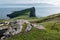 Landscape of peninsula at Neist Point at Isle of Skye, Scotland with stones in foreground