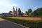 Landscape photo of Piarist Church of the Discovery. View from the park in the Castle Litomysl by summer day