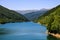 Landscape photo of Rausor Dam in the Iezer Mountains in Romania