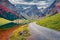 Landscape photography. Majestic autumn scene of Swiss Alpswith Santis peak on background