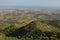 Landscape with pine tree on mountain valley slope, Trodos mountains, Cyprus. Sea seen from far away, Horizontal