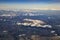 Landscape from plane window of high mountain in italy after plan