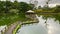 Landscape of a pond with its gazebo and walkway in Costa Rica