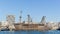 Landscape of the port of alicante with a big ship at the sea with a clear blue sky in alicante, spain