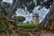 Landscape, Postcard taken in Belem, Portugal, the wall is enclosed in two trees.