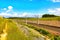 Landscape. Railroad in rural area in summer. Digital painting