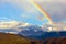 Landscape with rainbow of the Dolomites mountains