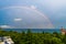 Landscape with a rainbow, sunset sky and Black Sea, Crimea