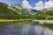 Landscape with Reflection of Muratov peak in river, Pirin Mountain