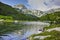 Landscape with Reflection of Muratov peak in river, Pirin Mountain