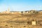 Landscape of a remote berber village with ruins and mosque in Sahara desert, Morocco