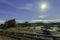 Landscape of the Riotinto Mines surrounded by cranes and buildings under the sunlight in Spain