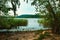 Landscape river cliff grass on the sky background