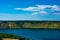 Landscape of river with Rocky Mountains. Summer Travel view