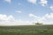 Landscape from the road, grass, trees and sky with clouds. Rio Negro, Uruguay