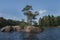 landscape rocks pine lake water reflection sky forest wildlife