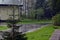 Landscape on a running rain next to a Christmas tree on a cottage background