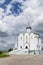 Landscape with the Russian Orthodox Church and cloudy sky. Russian village church.