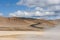 Landscape with s shaped road and geothermal mudpots, Hverir, Namafjall, Iceland