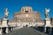 Landscape of San Angelo Castle in Rome, Italy with the bridge and statues and blue sky