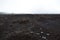 Landscape scenery with volcanic rock and cloudy mist