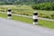 Landscape Scenic road travel on empty highway and concrete traffics pole with sky and clouds