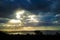 Landscape of the Sea Galilee - Sea of Galilee. Rain clouds above the lake. The sun`s rays break through the clouds