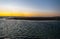 landscape with the sea at sunset with the shore