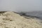 Landscape with seagulls,  sea view with breakwaters,  waves and sea shells,  clouds,  photographed in Gura Portitei,  Romania,  in