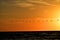 Landscape with the setting sun at the Baltic Sea and the key of