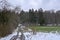 Landscape shot of clouds, grass and mountains in Germany, Vulkaneifel in Rhineland-Palatinate in spring