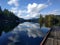 Landscape shot of a lake in Skookumchuck Narrows, Canada with the sky reflected in the clear water