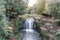 Landscape shot of a waterfall at Jesmond Dene, Newcastle upon Tyne, UK