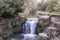 Landscape shot of a waterfall at Jesmond Dene, Newcastle upon Tyne, UK