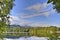 Landscape showing Reflections of Trees on Scottish Loch