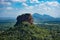 Landscape of the Sigiriya surrounded by forests on a sunny day in Sri Lanka