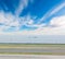 Landscape of sky and sea with runway in airport.