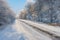 Landscape with slippery country road leading to Novo-Nikolaevka village in Dnepropetrovskaya oblast, Ukraine