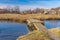 Landscape with small simple pedestrian bridge