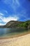 Landscape in spring lake nahuel huapi coast with sandy beach in Bariloche Argentina