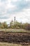 Landscape spring meadow view on church bell of Annunciation female monastery in Kirzhach, Vladimir region, Russia