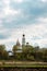 Landscape spring meadow view on church bell of Annunciation female monastery in Kirzhach, Vladimir region, Russia