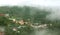 A landscape with stacked houses built and trees on the kodaikanal tour place.