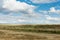 Landscape steppe. Tyva. Near the lake Dus-Khol. Sunny day. Clouds.