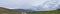 Landscape stormy panorama view from the border of Utah and Idaho from Interstate 84, I-84, view of rural farming with sheep and co