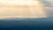 Landscape of sunbeam shining on blue mountain range