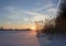 Landscape.sunrise,frozen river, reeds in the morning mist.