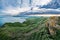 Landscape. sunset on the top of green mountains overlooking the sea.